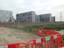 Google's data center building in Eemshaven, Netherlands, with the Google logo on its facade.