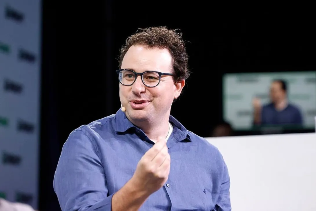 Anthropic CEO Dario Amodei speaking on stage at TechCrunch Disrupt
