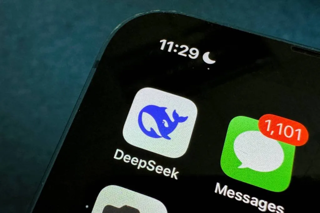 The DeepSeek app icon, showing its blue whale logo, on a smartphone home screen.